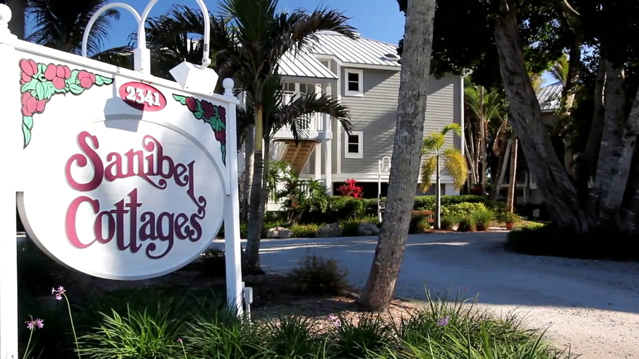 Entrance sign and cottages at Sanibel Cottages Resort
